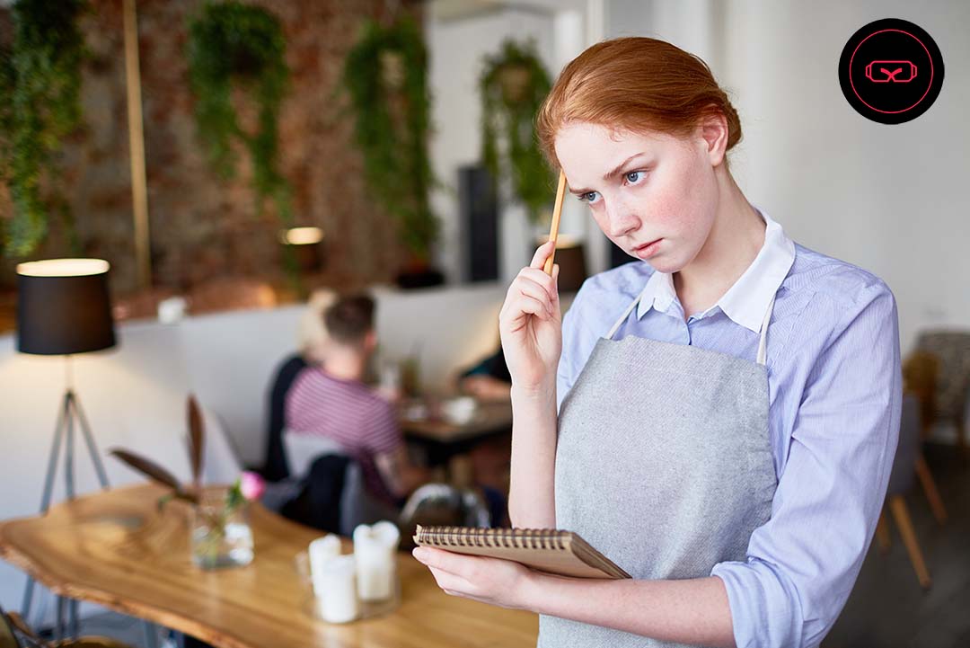 Image of a waiter trying to remember the order